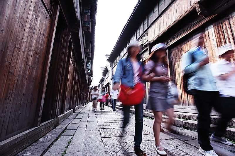 Tourists walking in Hangzhou. Tourists walking in Hangzhou.