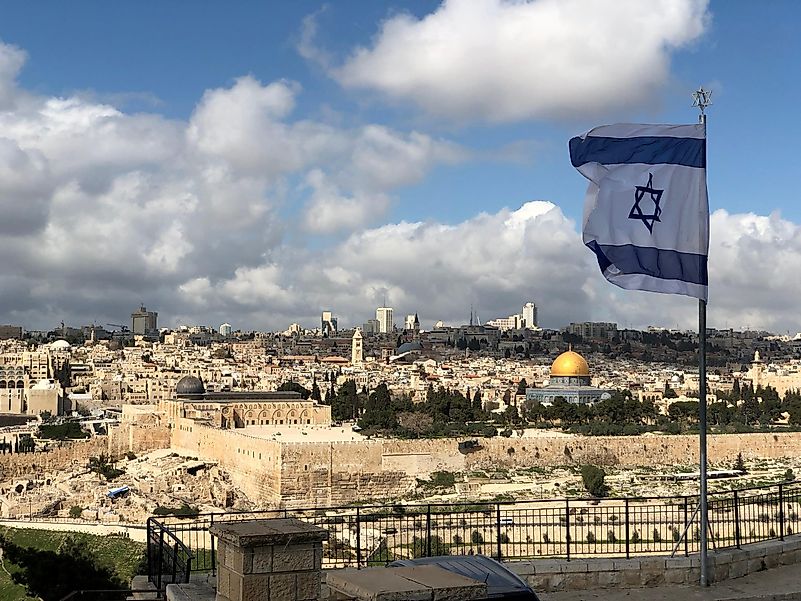 Israel flag above the old city of Jerusalem, Israel. Israel flag above the old city of Jerusalem, Israel.