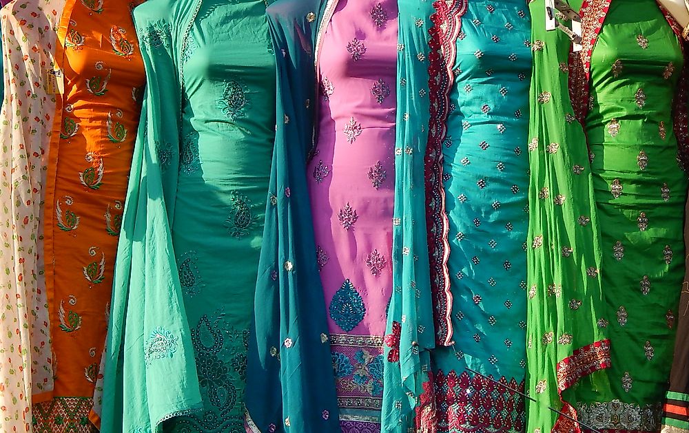 A woman in a traditional Indian salwar kameez with dupatta.