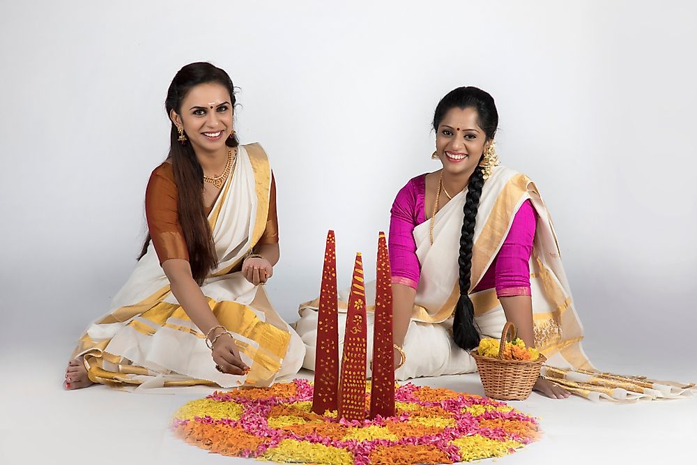 An Indian woman wearing a colorful traditional sari.