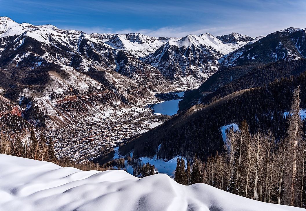 Aerial view of Telluride and the San Juan Mountains in winter. 