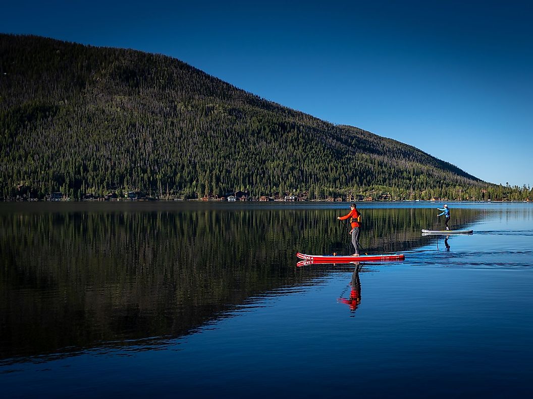 Paddle boarding in the Grand Lake, Colorado. Editorial credit: Markel Echaburu Bilbao / Shutterstock.com