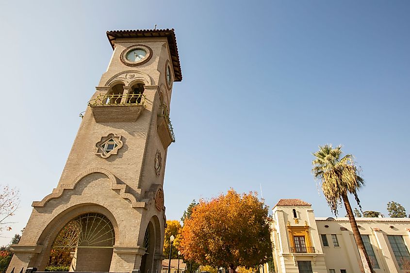 Daytime view of a historic public clock tower in downtown Bakersfield, California. 