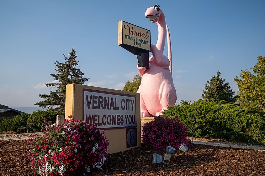 Sign for Vernal Utah, with its famous pink dinosaur statue.