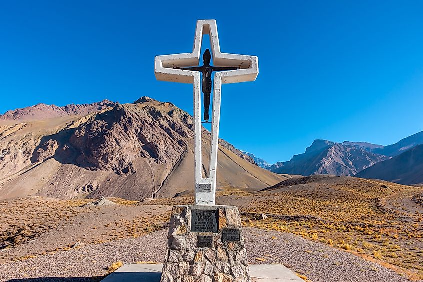 Isolated Large Religious Catholic Crucifix Cross, Outdoor Landmark at Entrance to Famous Mount Aconcagua Provincial Park.