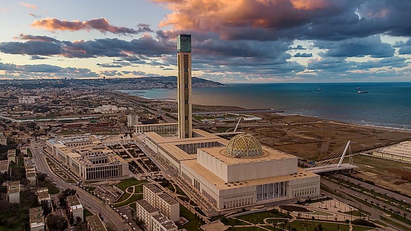 The Great Mosque of Algiers with a beautiful sunset in the background.