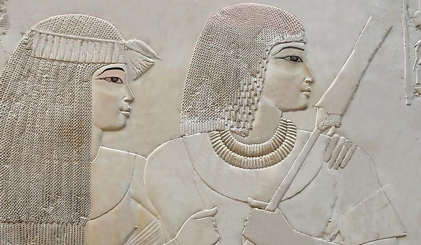 Exquisite portrait of young loving couple with frizzy hair from the Tomb of Ramose in the ancient egyptian necropolis of the nobles at thebes near Luxor, Egypt