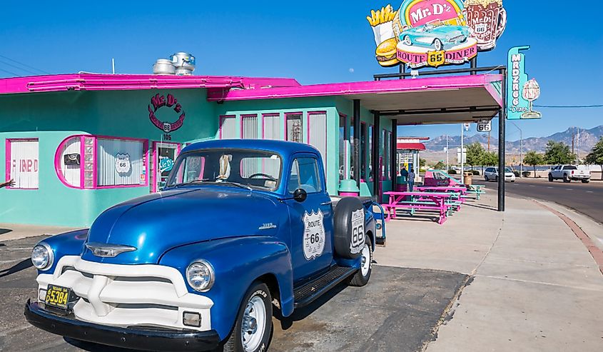 View of vintage station wagon and Mr D'z Diner on Route 66 in Kingman, Arizona