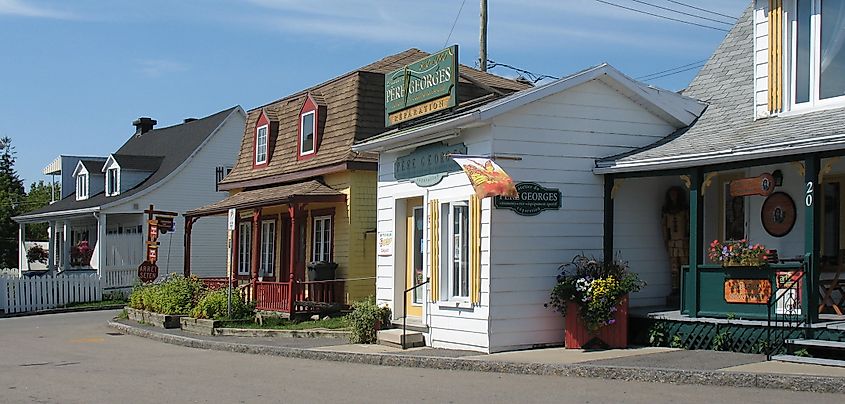 Traditional storefronts and historic buildings in Wendake, Quebec.