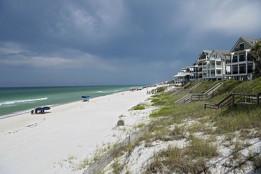 Overlooking the beach and people with umbrellas at Rosemary Beach, Florida. 