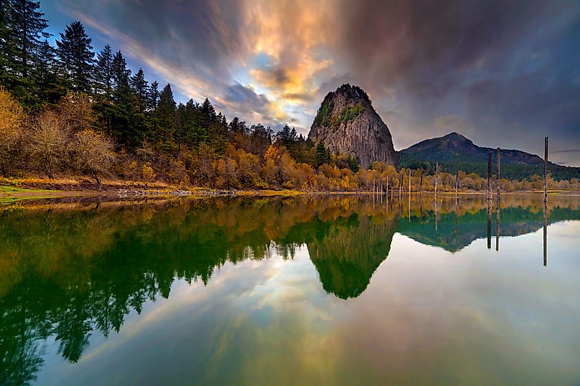 The Beacon Rock along the Columbia River Gorge during sunset.