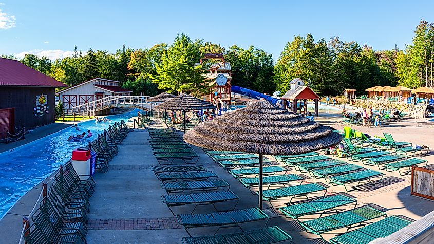 Old Forge, New York: Wide Horizontal View of the Basin Stream of the Water Safari Park with People Swimming, via Mahmoud Suhail / Shutterstock.com