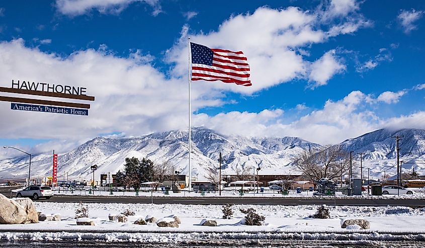 American Flag with snow covered mountains in background Hawthorn Nevada