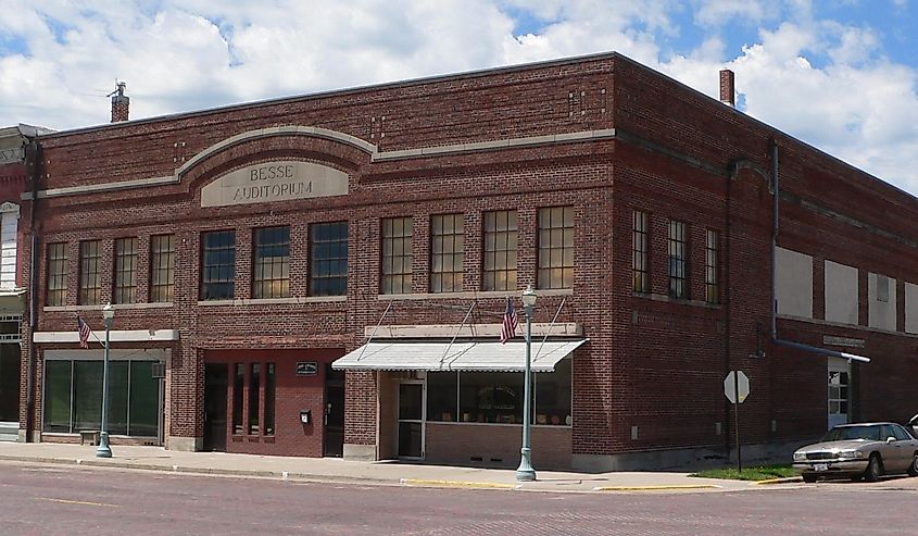 Besse Auditorium, on the southwest corner of 5th Avenue and Webster Street in Red Cloud, Nebraska;