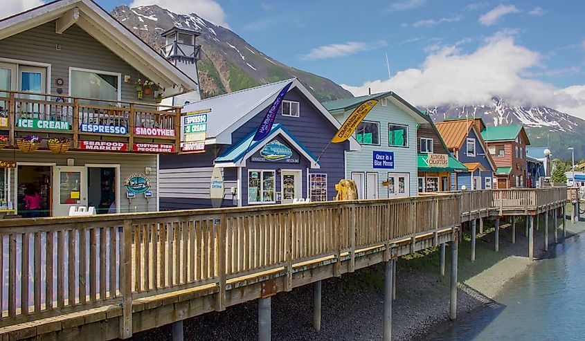 Shops along the dock in Seward Harbor in Resurrection Bay in Seward, Alaska