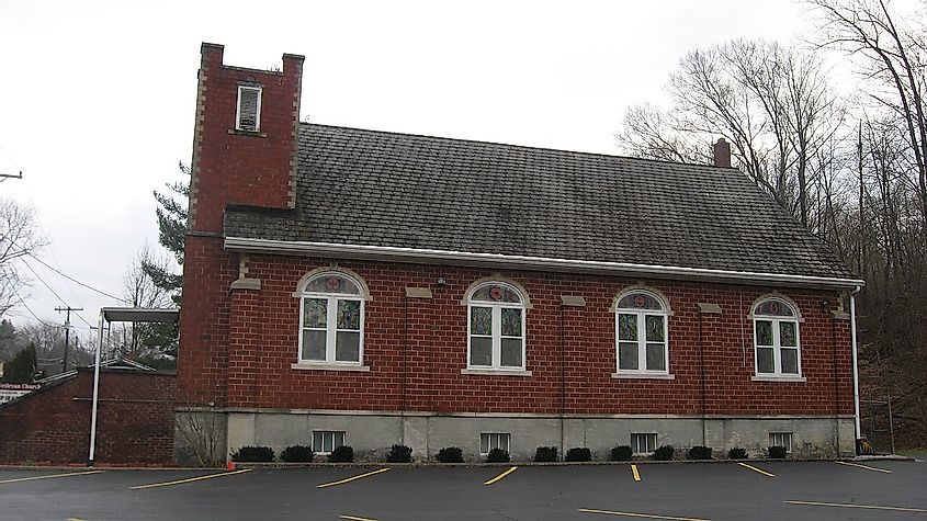 Northern side of the Pilgrim Holiness Church, located at 312 Main Street (State Road 237) in English, Indiana