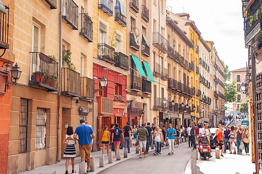 ople walking down the popular city centre street Calle Cava Baja in La Latina, Madrid, Spain. Editorial credit: Alex Segre / Shutterstock.com