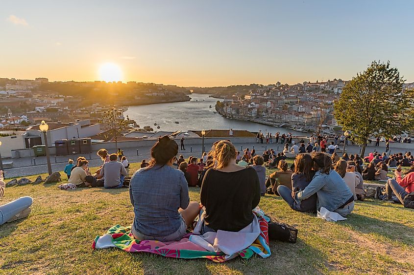 View to Porto Old Town during sunset. The riverside is full of nice restaurants to have a small break and enjoy the romantic sunset.