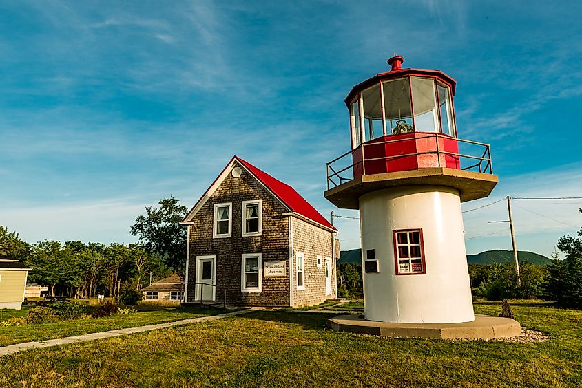 Dingwall, Nova Scotia, Canada, Aug 2019: Saint Paul Island Museum & Lighthouse. Canada's first cast iron Heritage Lighthouse. Cabot Trail in Cape Breton Highlands National Park