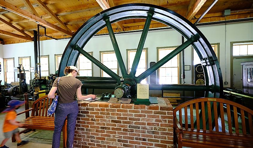 A woman examines a display at the Connecticut Antique Machinery Association in Kent, Connecticut