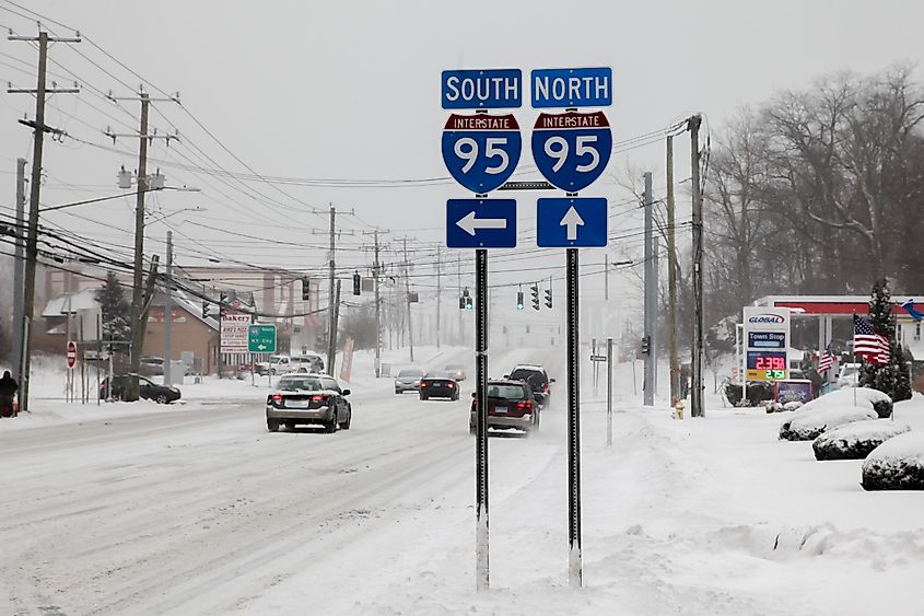 Traffic sign for Interstate 95 on Connecticut Avenue during winter snow storm day