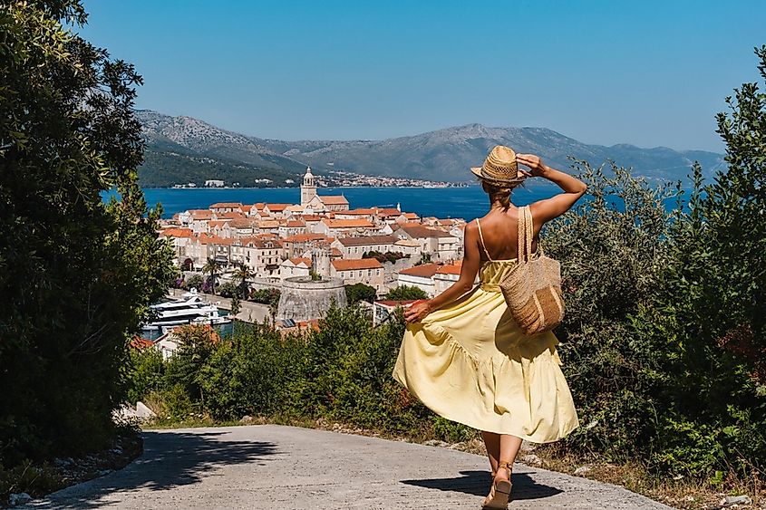 Female tourist enjoying summer vacation in Croatia, Korcula Island