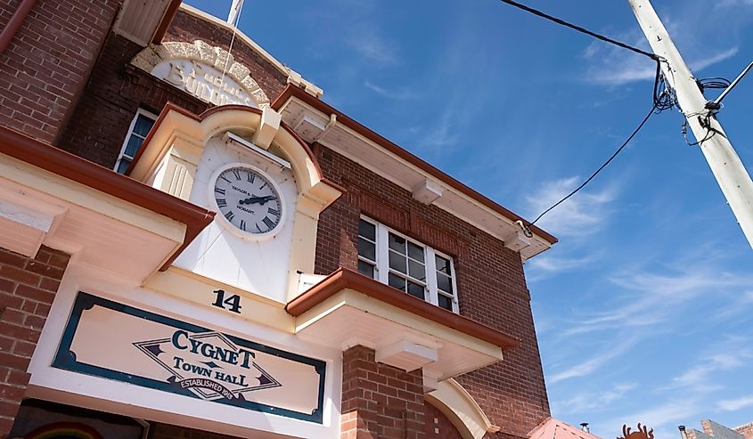 Facade with clock of the Cygnet Town Hall at blue sky in Southern Tasmania
