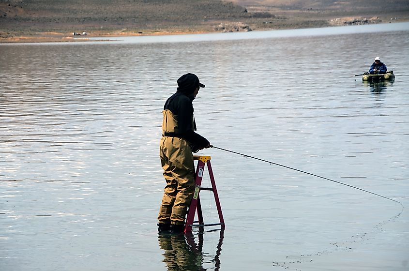 An angler fishing at Pyramid Lake, a large natural lake in Nevada