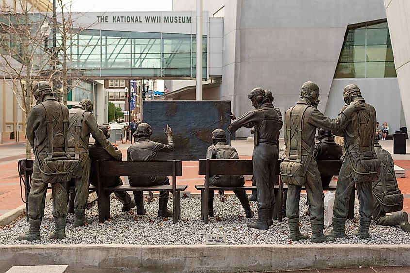 Bronze sculpture depicting a World War II military briefing outside the National WWII Museum.