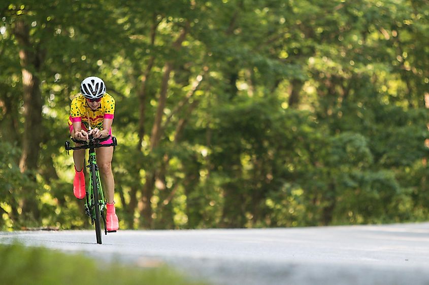A cyclist does a weekend ride on a hilly road through the North Georgia mountains Blairsville, Georgia..