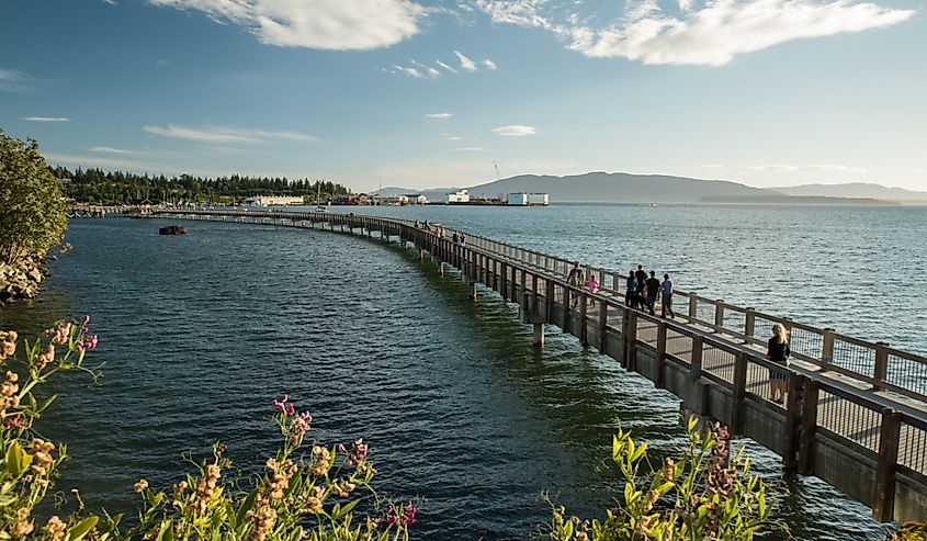 Bellingham, WA, USA. Taylor Street Boardwalk on Bellingham Bay on a summer's evening.