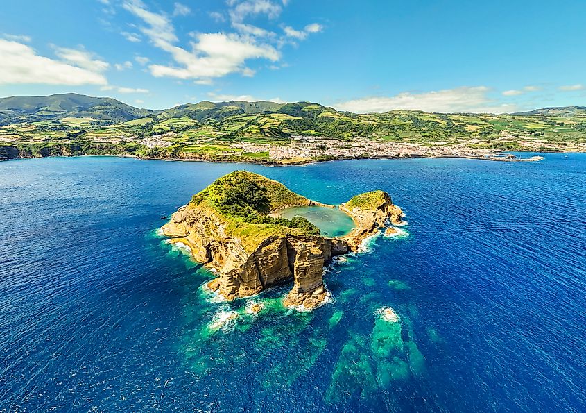 Panorama of Vila Franca Islet, Vila Franca Do Campo Town and Atlantic Ocean. Credit: maxterram / Shutterstock