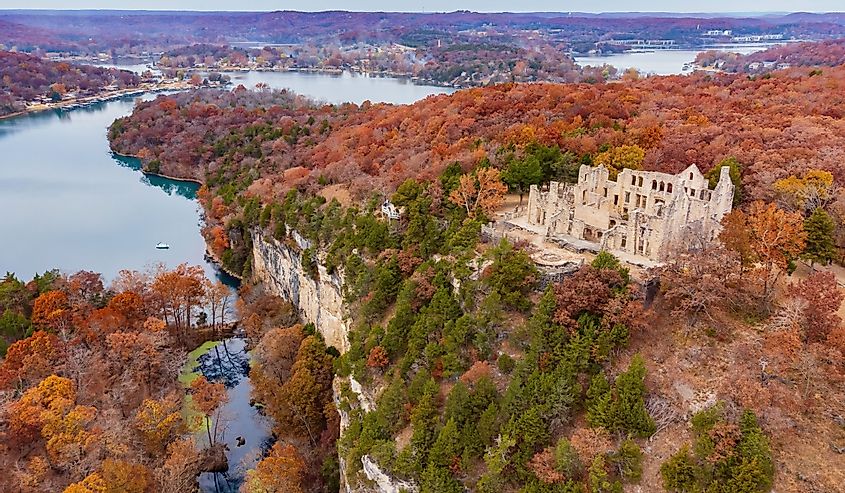 Aerial view of the fall color of Lake Ozark and the castle ruins at Missouri