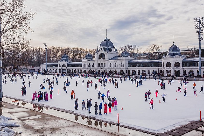 Many people spend their holidays skating in City Park ice rink in Budapest, Hungary