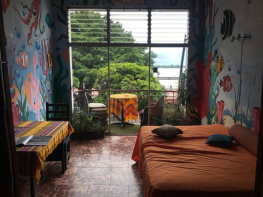 A cool common area in a hippie hotel - window overlooking a tropical river