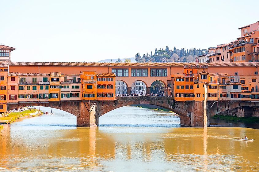 The Ponte Vecchio is a medieval stone closed-spandrel segmental arch bridge over the Arno River, in Florence, Italy.