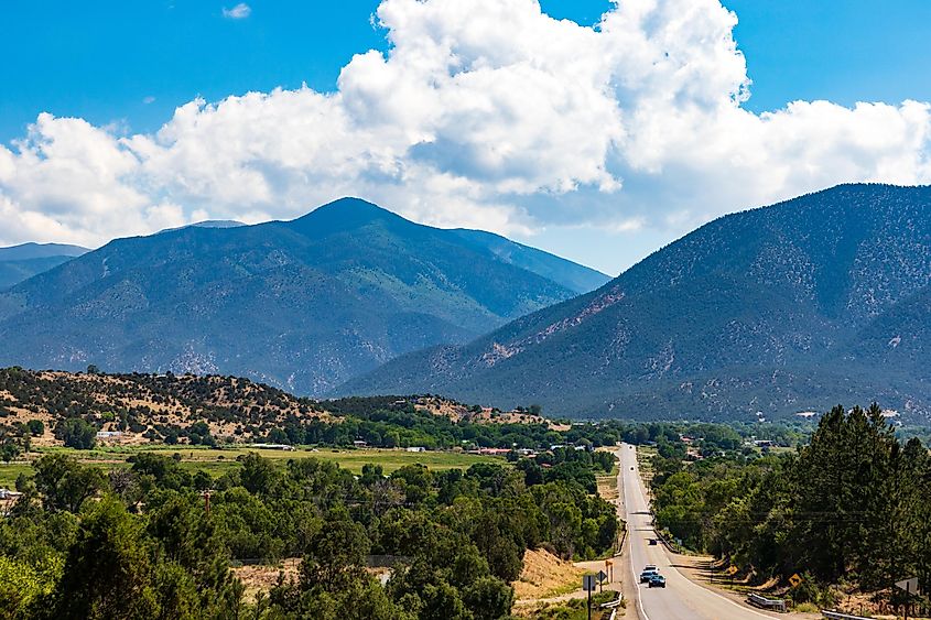 Highway 38 running into the mountain town of Questa, near Taos in northeast New Mexico, USA.