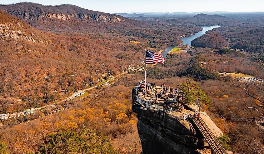 Chimney Rock at Chimney Rock State Park and Lake Lure, North Carolina, USA in fall season.