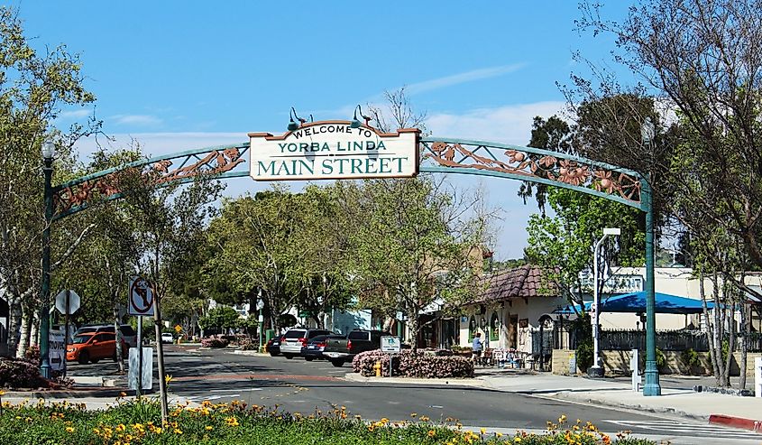 Sign welcoming visitors to Main Street retail district of Yorba Linda, home of the President Richard Nixon Library.