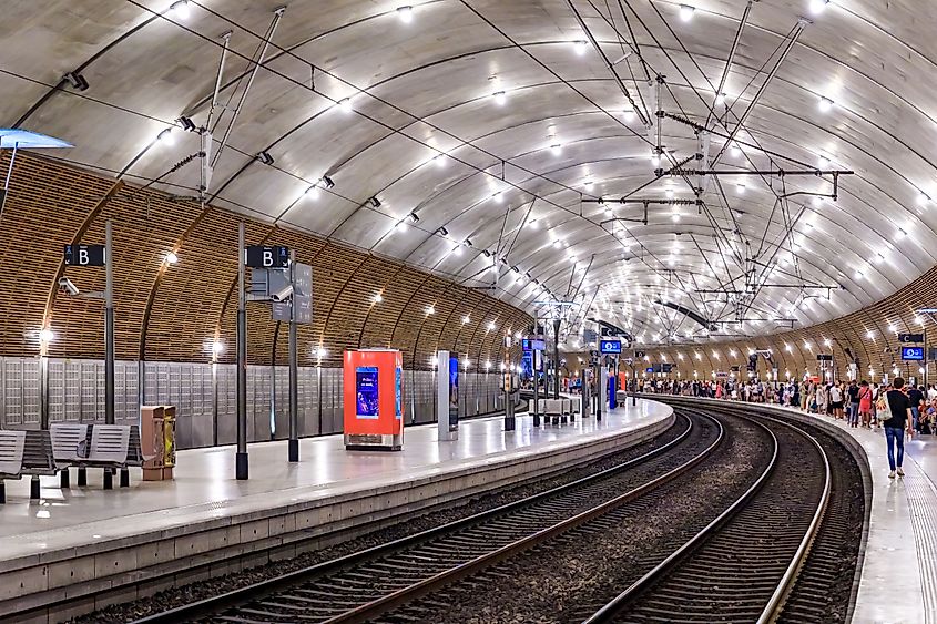 Train tracks disappearing into the tunnel in Monte Carlo, Monaco.