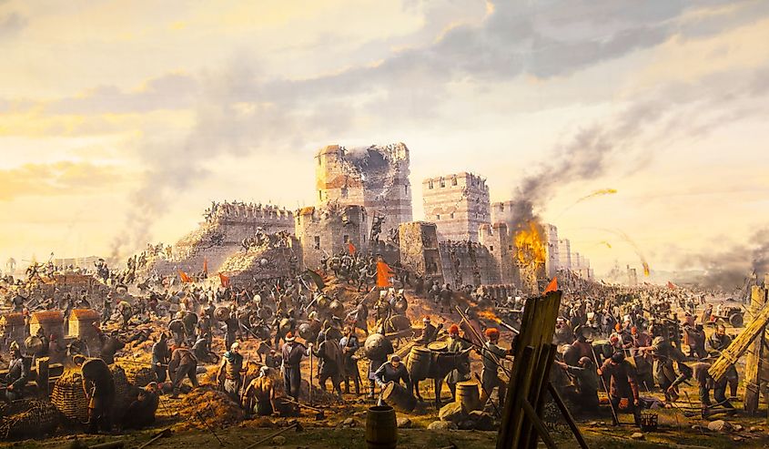 The Ottomans attacking the city with cannons and ladders. 