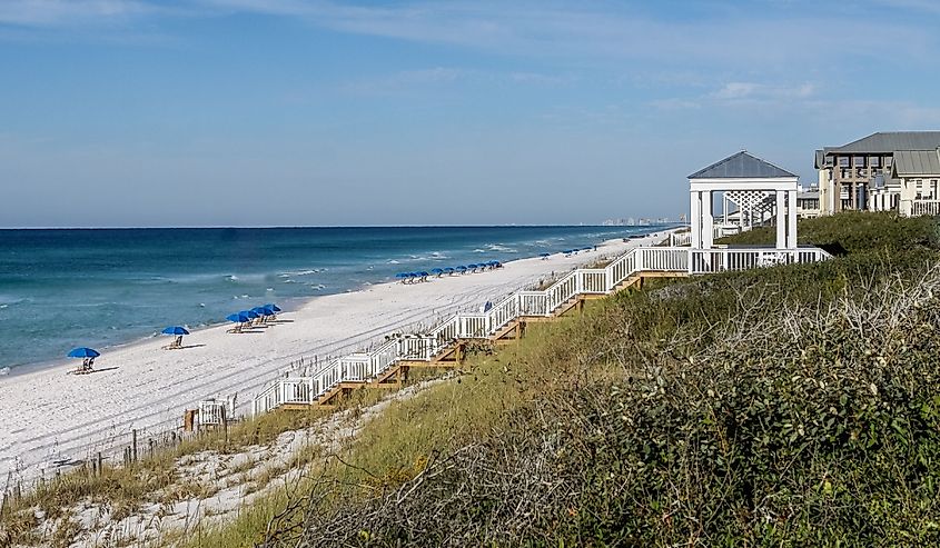 Crisp white stairs tumble down a dune on Santa Rosa Beach