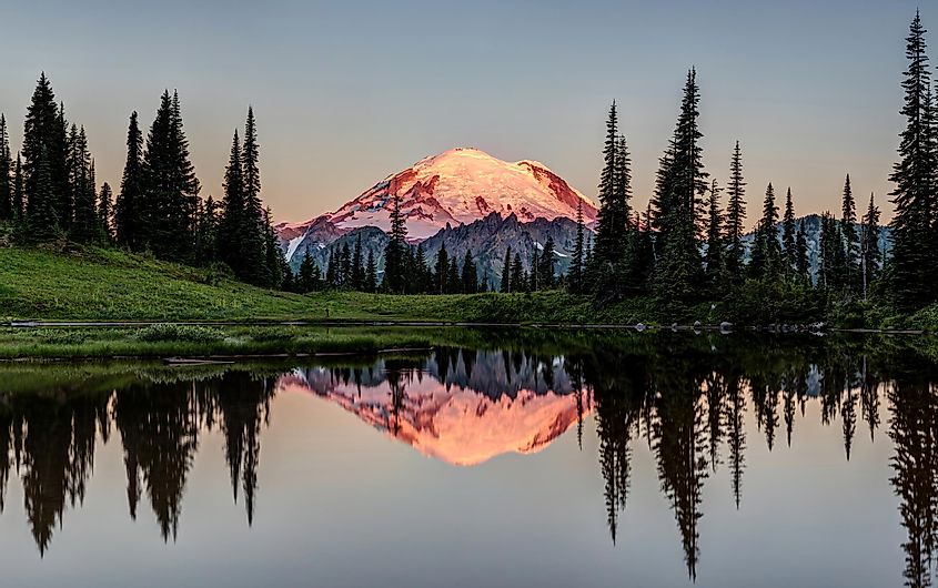 The reflection of Mount Rainier on the calm waters of the Tipsoo Lake in the Mount Rainier National Park, Washington.