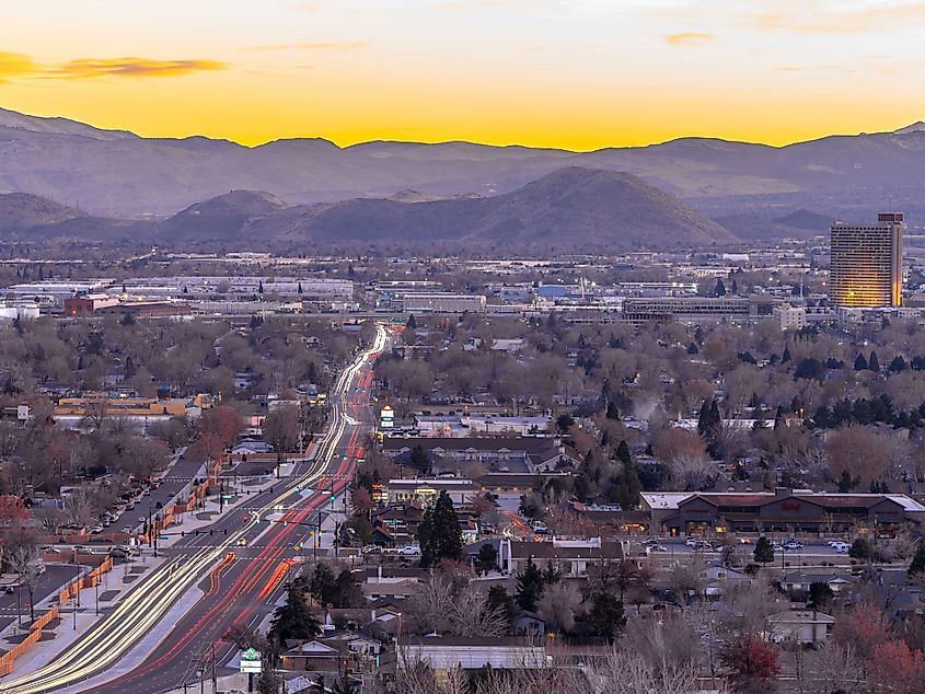 Long exposure view of the city of Sparks with hotels, casinos, businesses and light trails