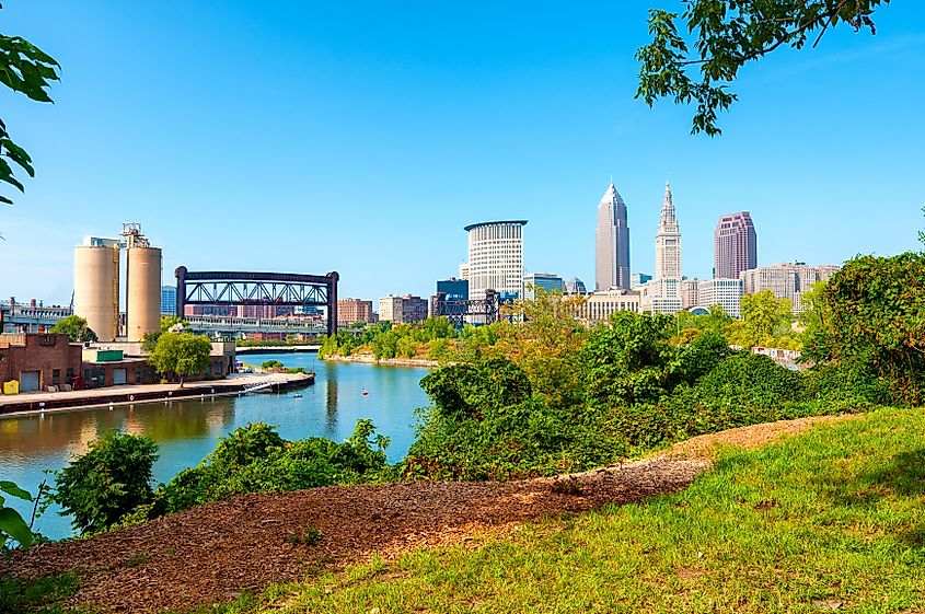 View of downtown Cleveland, Ohio, and the Cuyahoga River from a park on the west bank of the river.