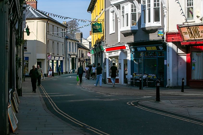 Shoppers in the quaint winding streets of Brecon, Wales, the United Kingdom