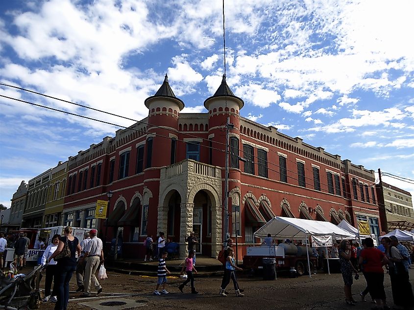 Beautiful architecture in downtown Abbeville's Magdalen Square during the annual Giant Omelette Festival in South Louisiana, USA.