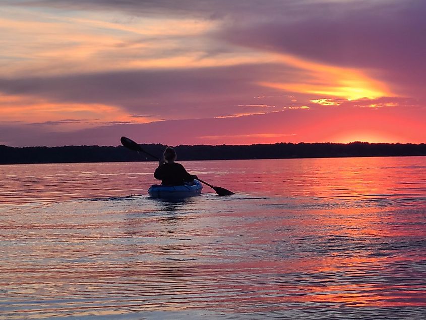 Kayaking at sunset in Torch Lake, Michigan