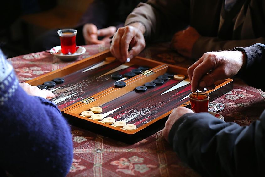People playing backgammon.