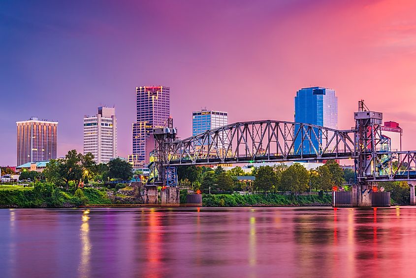 Little Rock, Arkansas, USA skyline on the river at twilight.